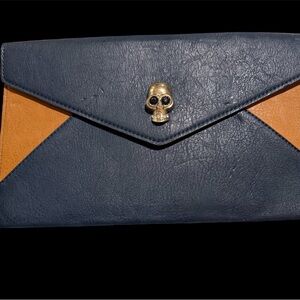 Elegant Black and Tan Clutch with Skull Detail could use a little re hab